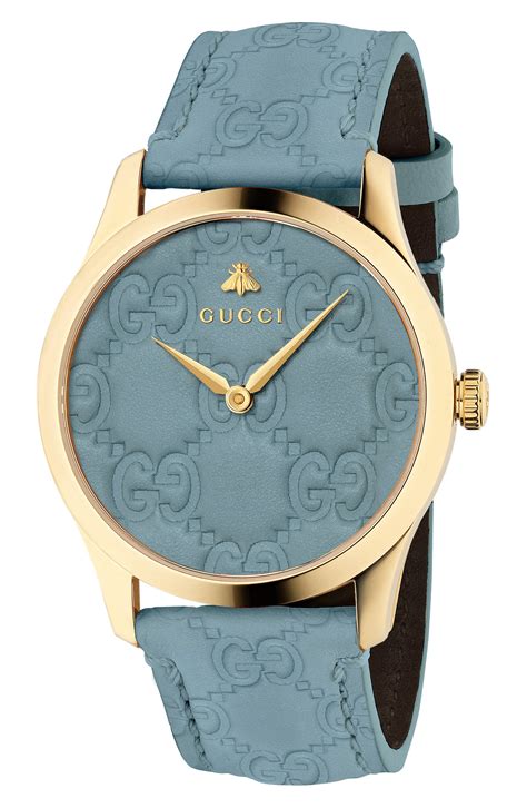 Gucci watch with leather band